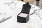 An Elegant Black Box Filled with Pink Preserved Roses