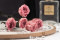 Five preserved pink roses heads on a stem 