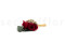 A romantic boutonniere in vibrant red tones, made with preserved flowers and foliage