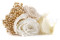 A boutonniere for a special occasion in white and cream tones, made with preserved flowers and foliage.